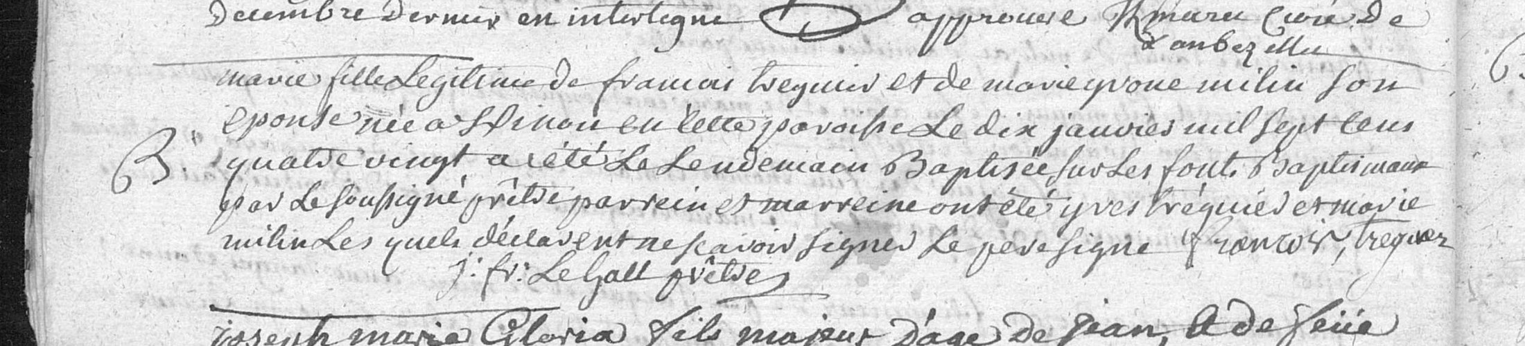 Un acte de baptême manuscrit de six lignes, avec en marge la lettre B